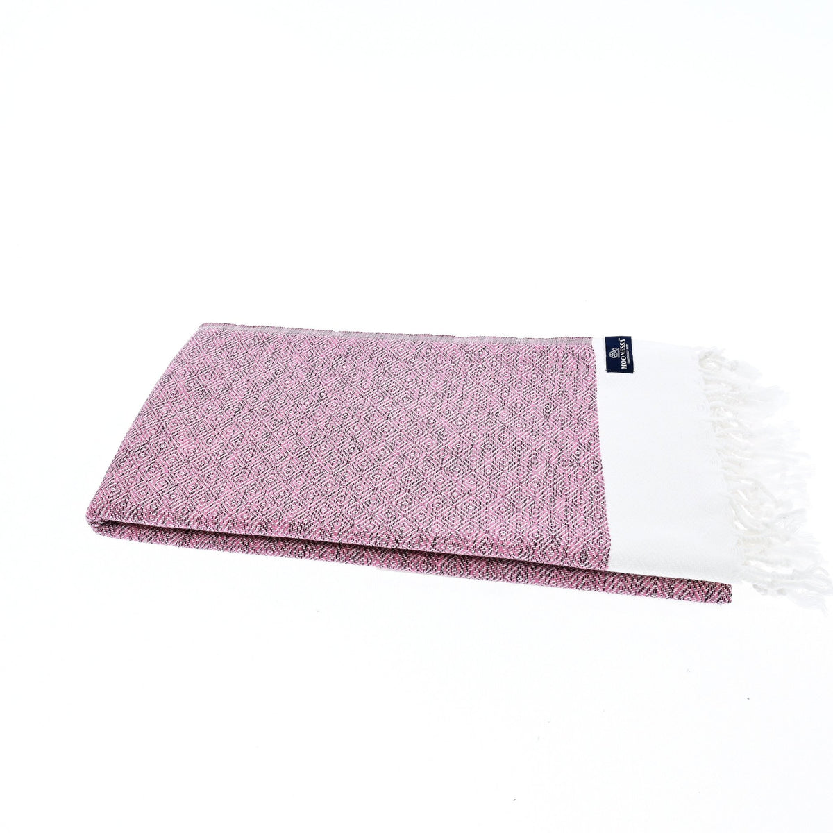 Madrid Turkish towel in mauve folded flat, showing the combed cotton diamond weave