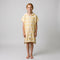 Amalfi kids hooded towel in yellow and white stripes worn by a girl, studio photo, front view