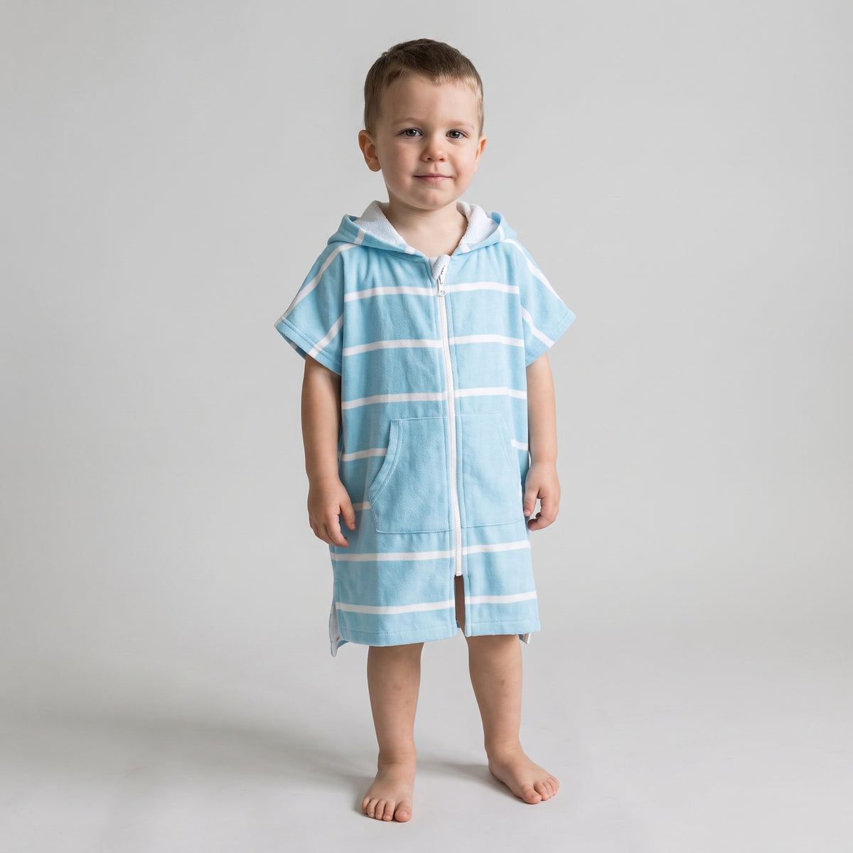 Toddler boy in the Amalfi aqua and white toddler zip hooded towel, studio photo, front view