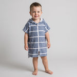 Toddler boy in the Amalfi navy and white toddler zip hooded towel, studio photo, front view
