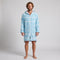 Man wearing the long sleeve Amalfi aqua and white striped adult hooded towel, studio front view
