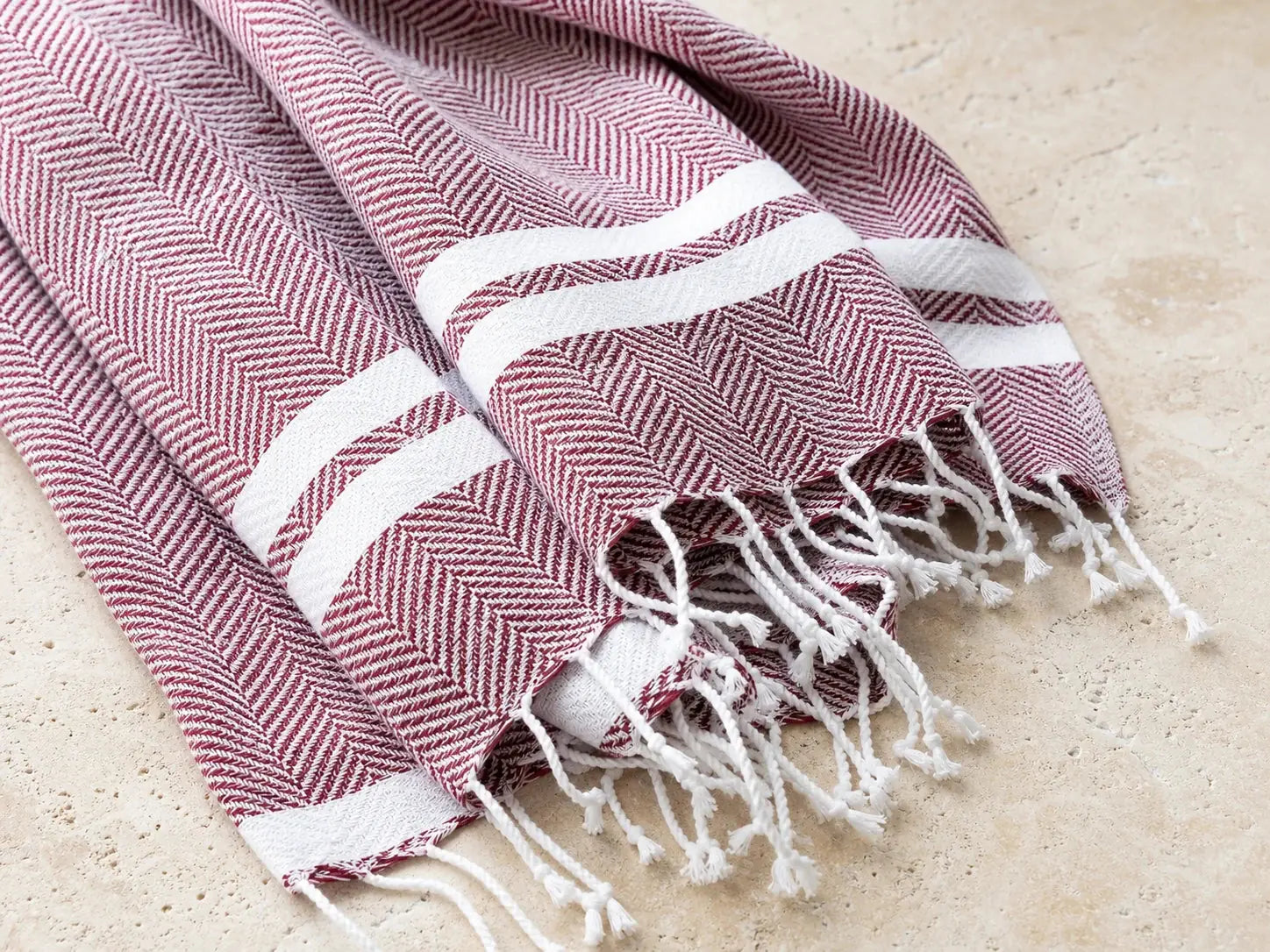 Layered folds showing the fuller weave of an Istanbul Burgundy plush Turkish towel