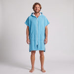 Man wearing the Santorini Aqua hooded towel, front view on a plain studio background