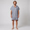 Man wearing the Santorini Navy Turkish hooded towel, front view on a plain studio background